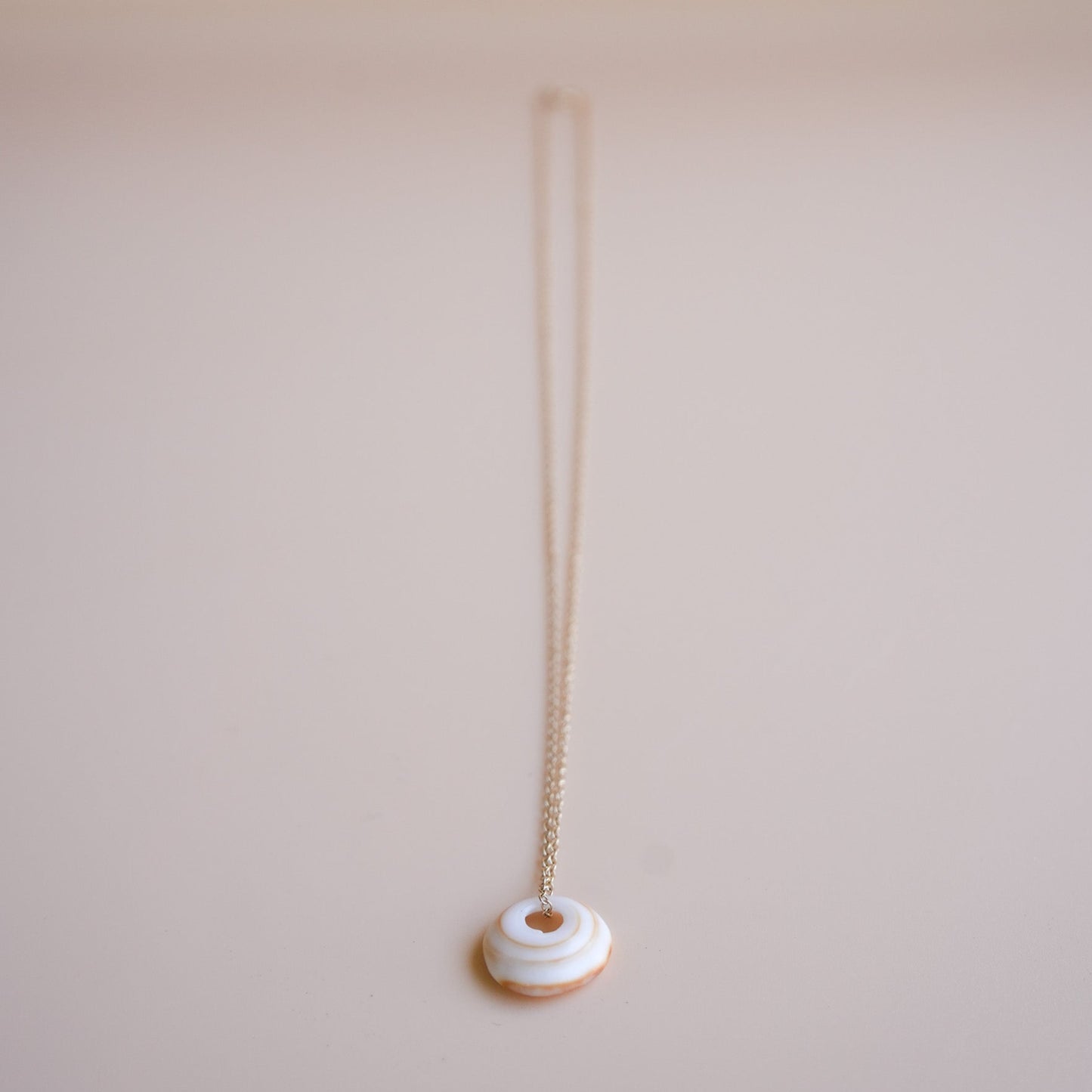 14K SINGLE PUKA CHARM NECKLACE