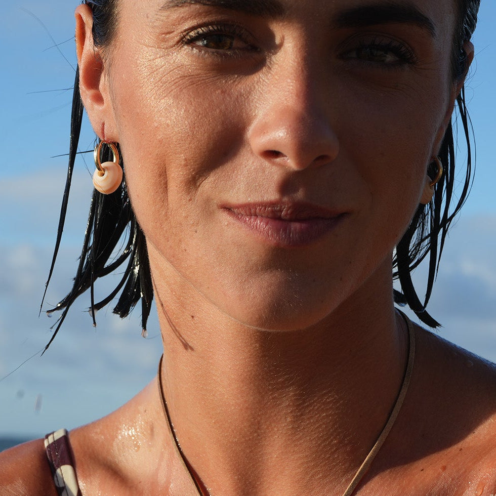 Single Puka Shell Hoop Earrings — detail view, Studio Immersed