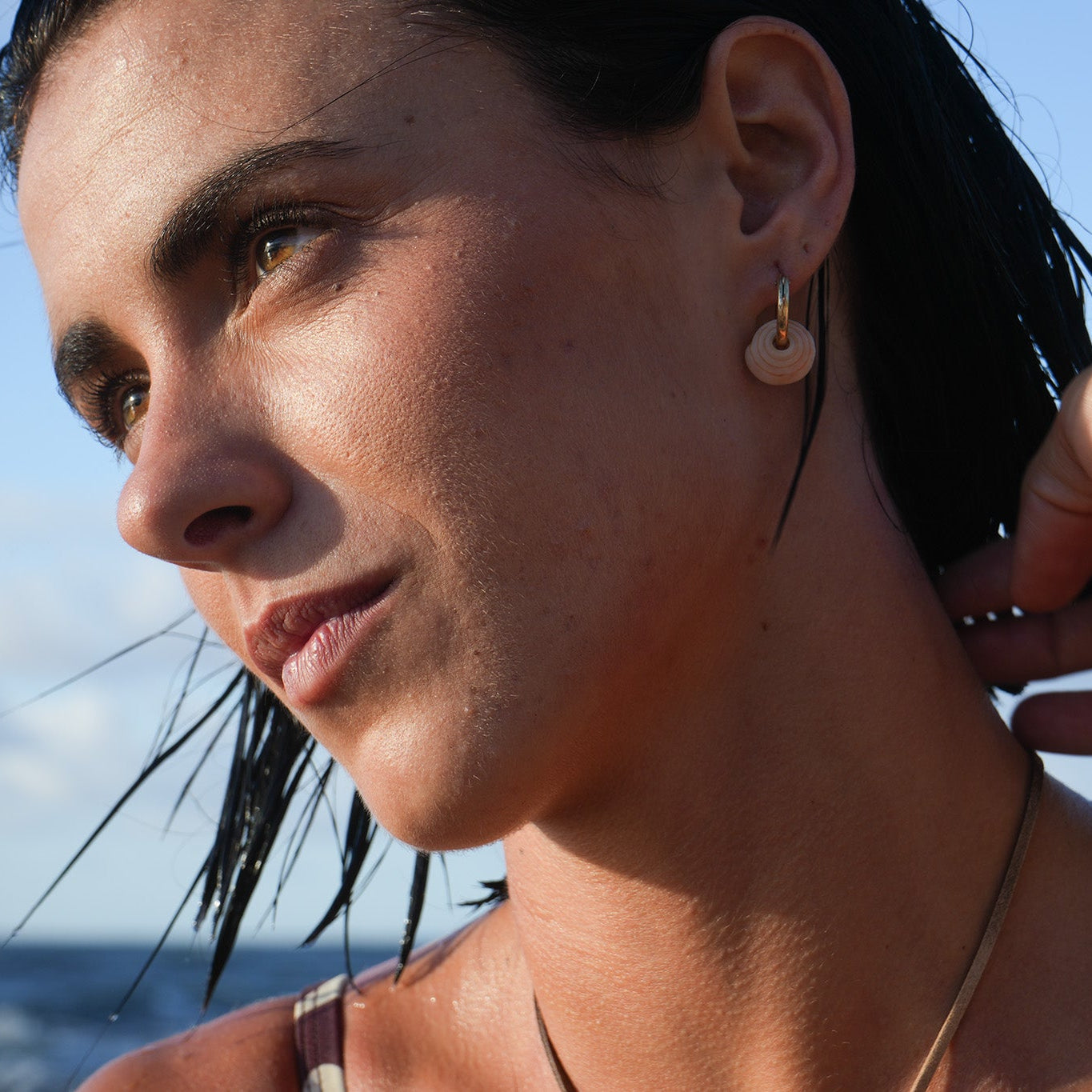 Single Puka Shell Hoop Earrings — handmade jewelry by Studio Immersed, Maui Hawaii