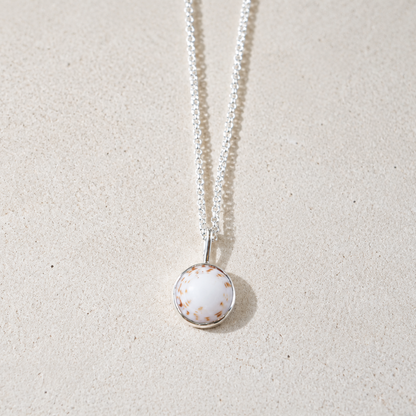 PUKA CHARM IN WHITE