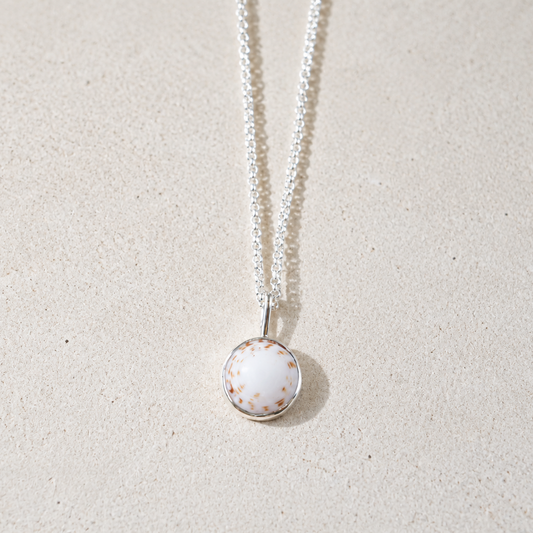 PUKA CHARM IN WHITE