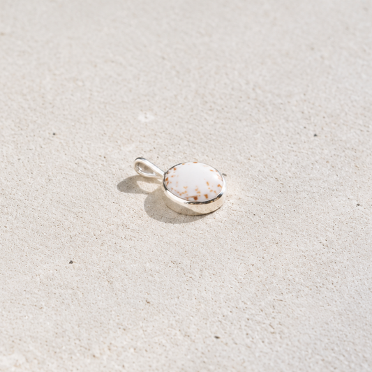 PUKA CHARM IN WHITE