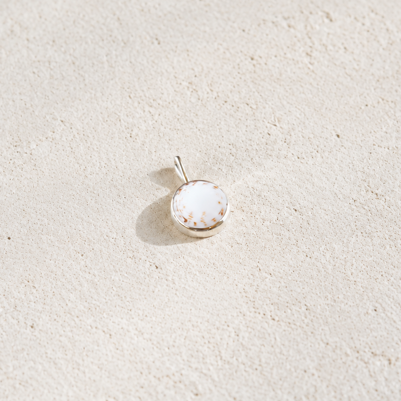 PUKA CHARM IN WHITE