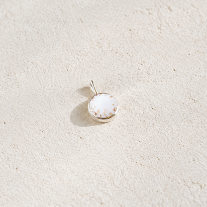 PUKA CHARM IN WHITE